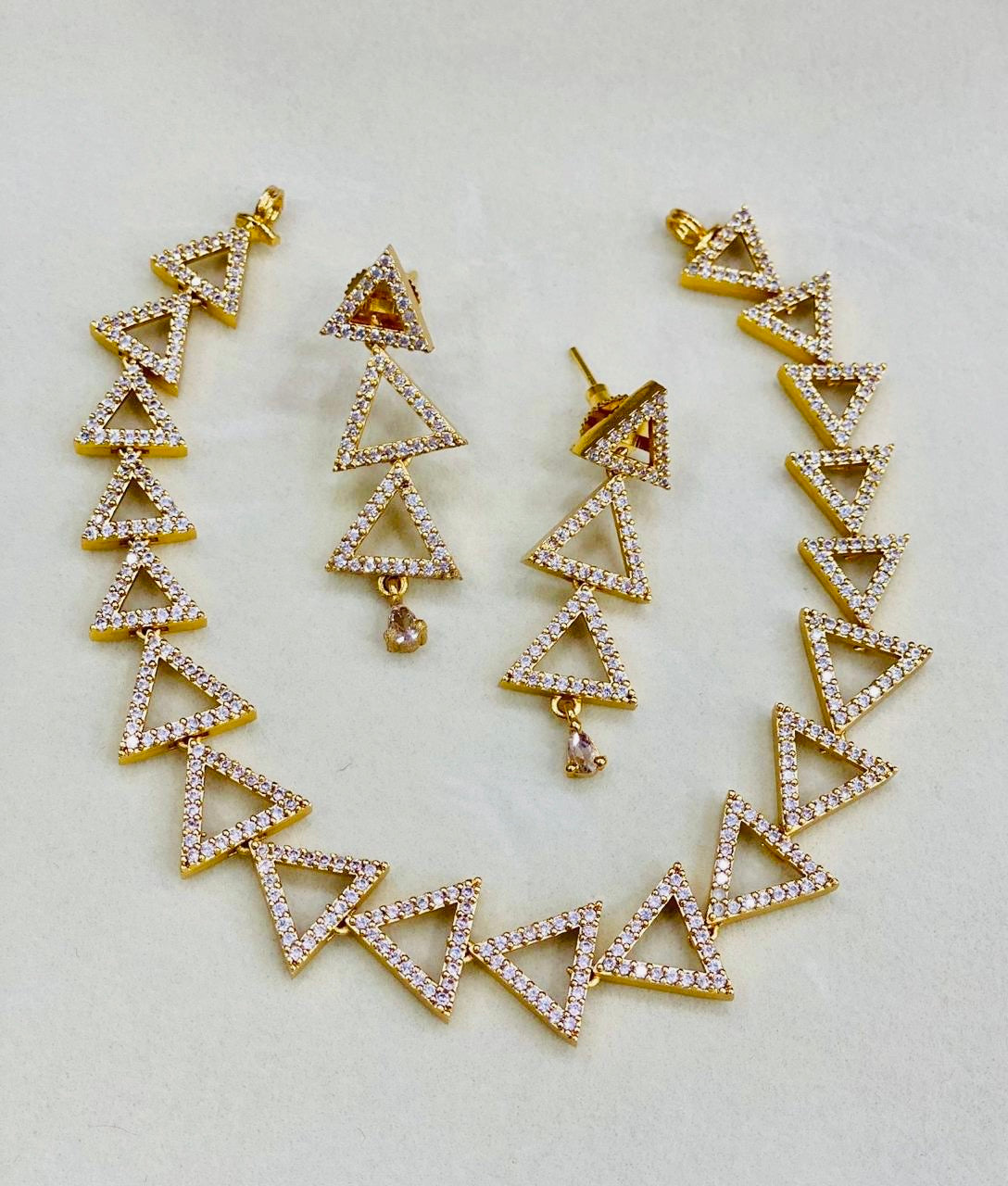 Stone Studded Triangle Cut Gold Plated Necklace with Matching Earrings