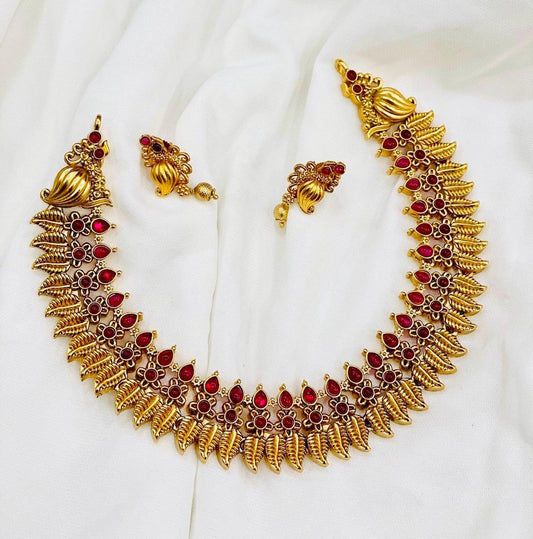 Gold toned choker necklace set with red stone